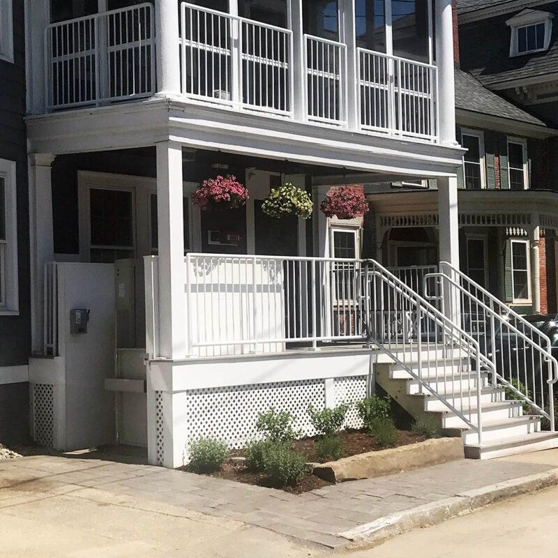 exterior of house with vertical wheelchair lift on side