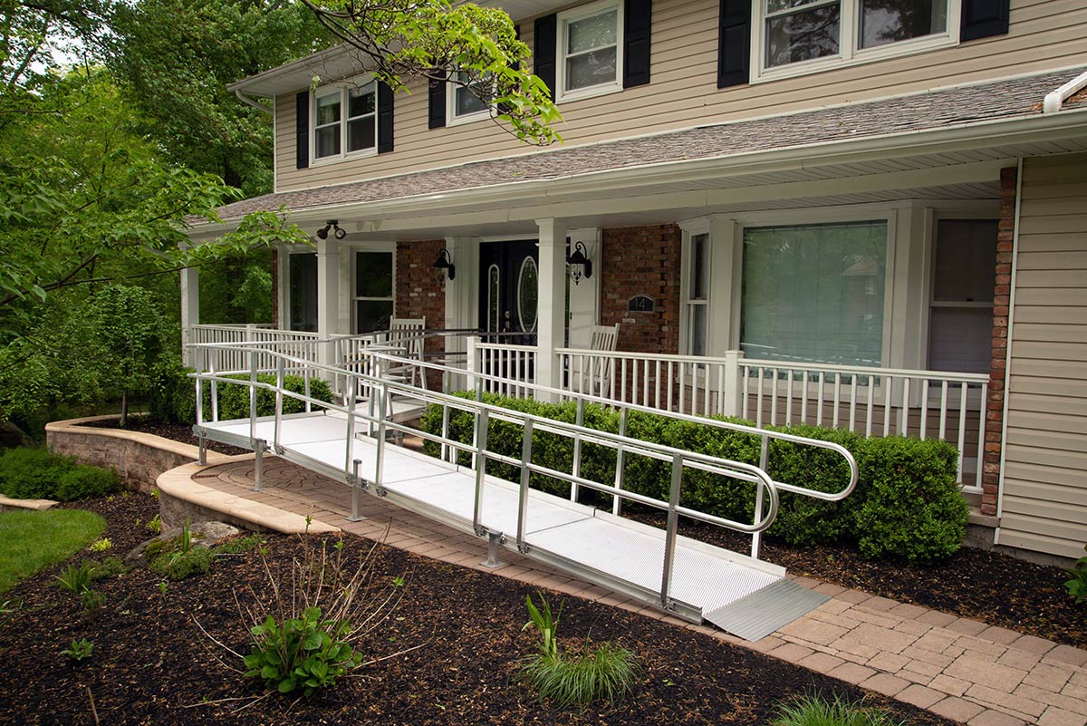 home exterior with wheelchair ramp in white