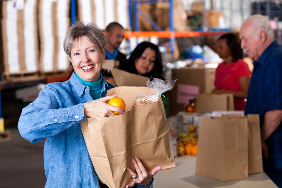 woman helping at food pantry