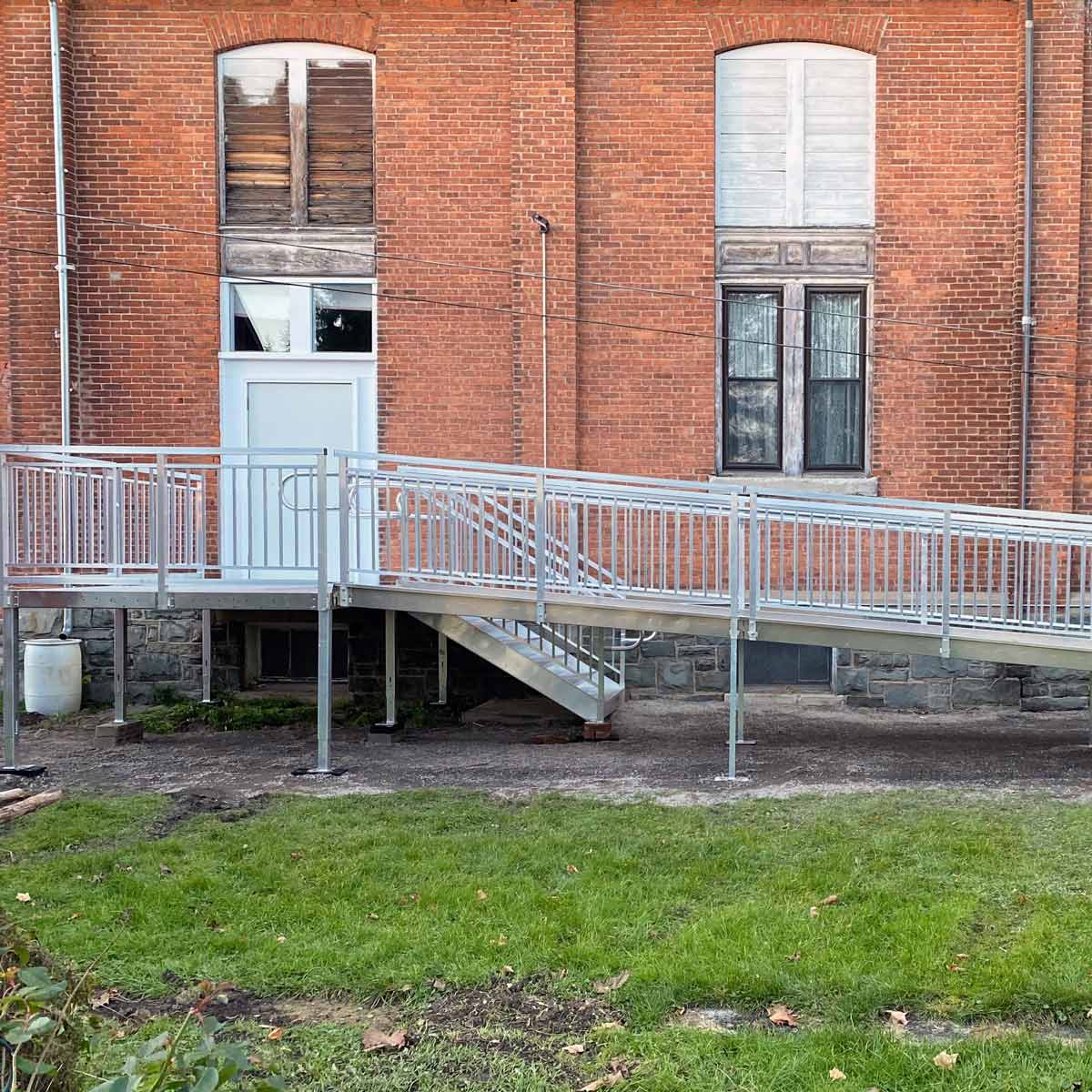 home exterior with wheelchair ramp in silver