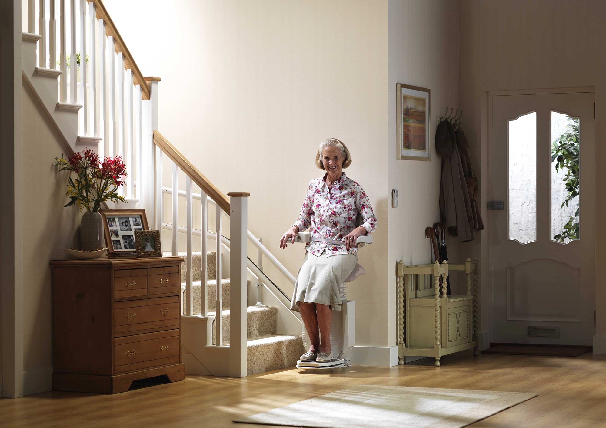 woman siting on residential stair lift