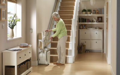 Old woman using stairlift